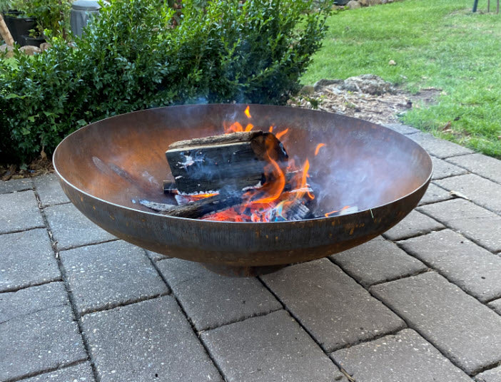 Mornington firepit with real fire on pavers 